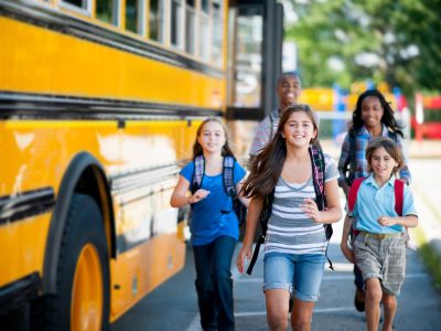 Elementary kids taking the school bus